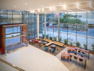 largely glazed facade viewed from inside building